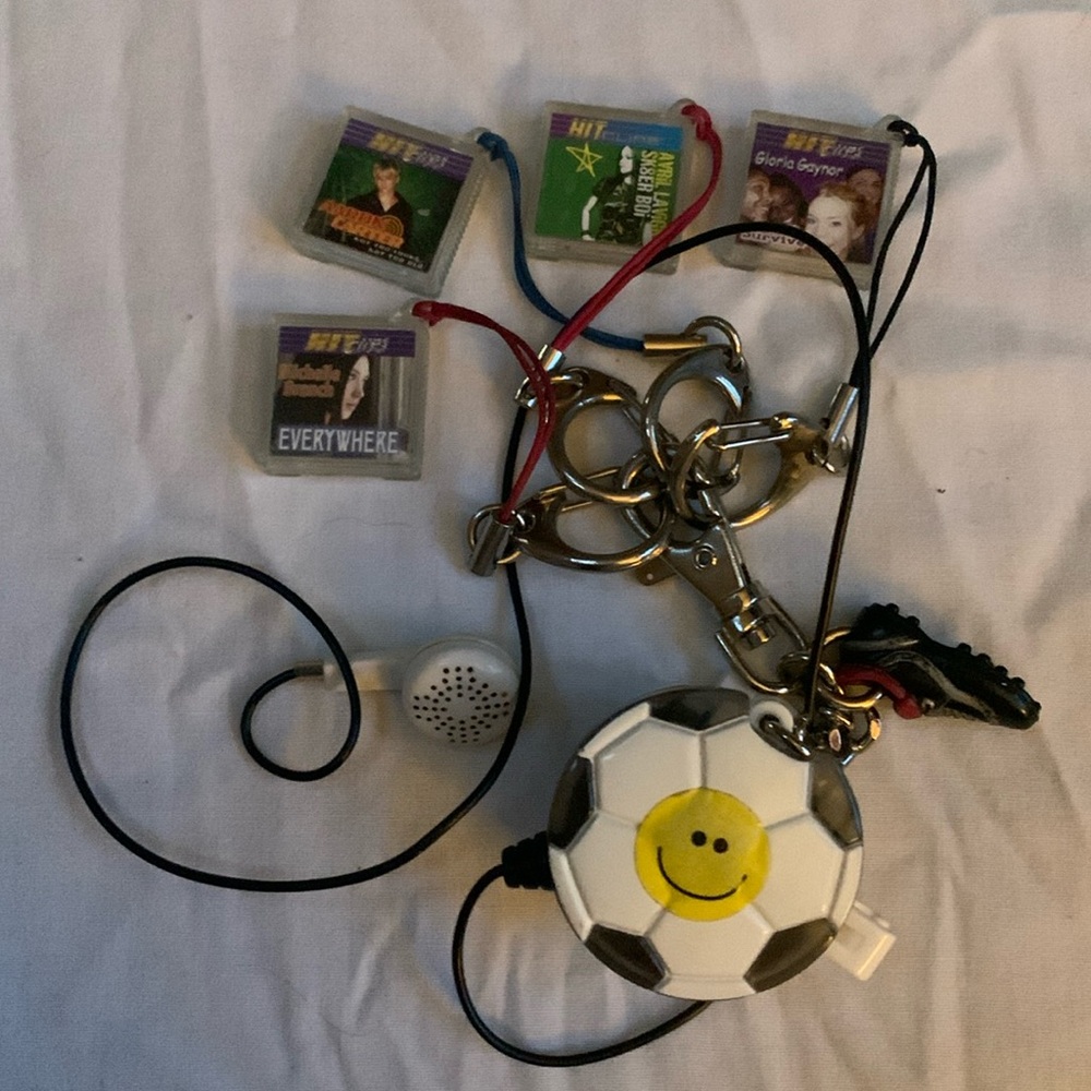 2 Hit clip audio toys.  Both work like new.  Has 4 song cassettes.